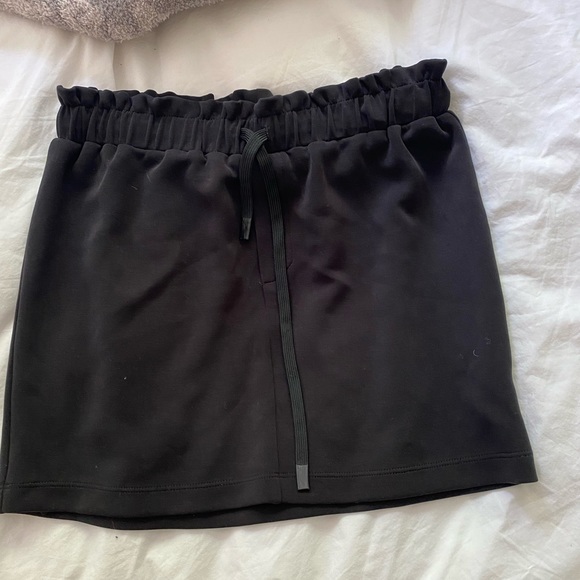 Matching set. Scuba type material, boxier fit. Skirt and top sold together - Picture 6 of 6